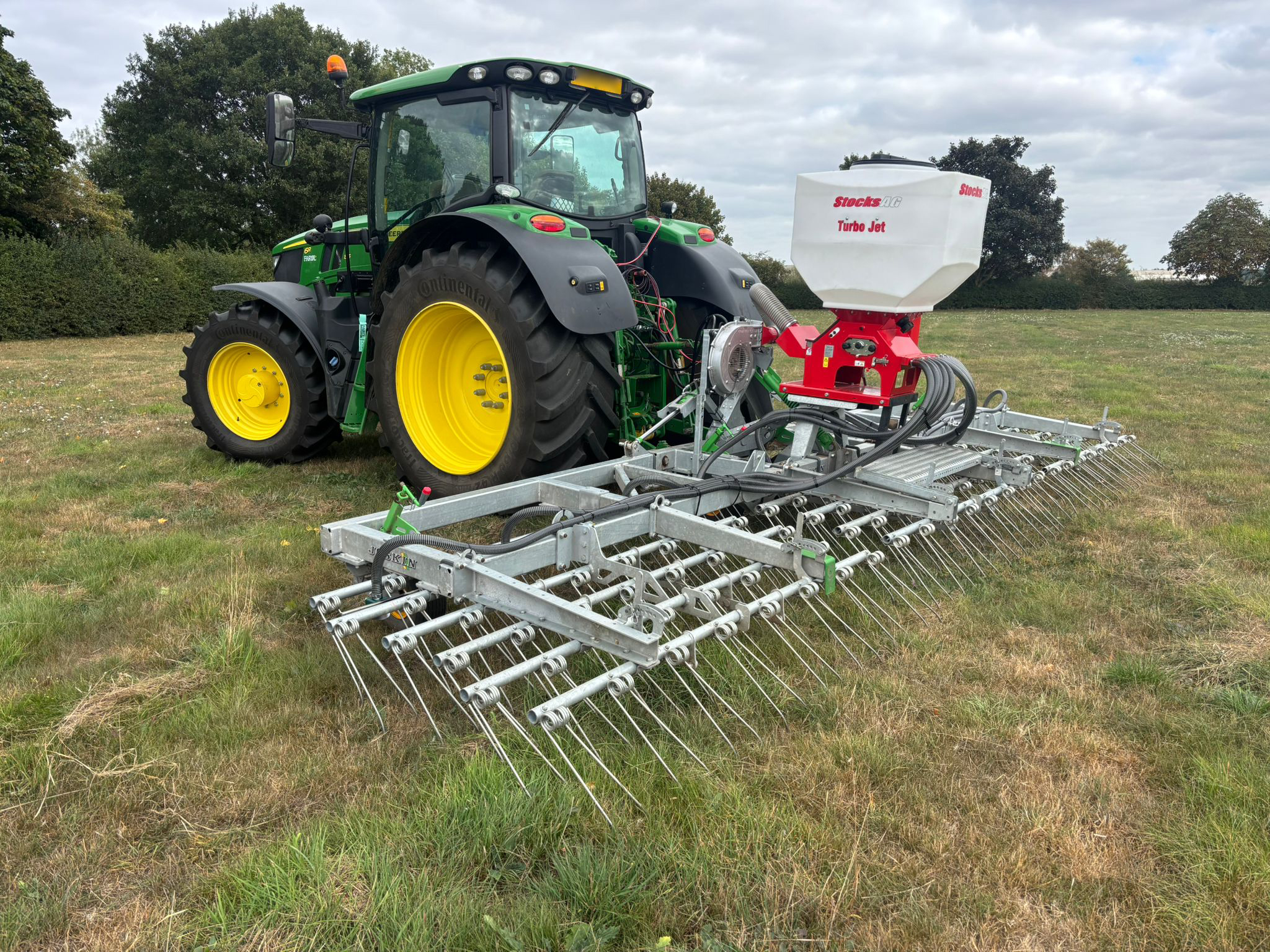 Stocks Ag Turbo Jet 10 Hydraulic fitted to Joskin Grass Harrow in field